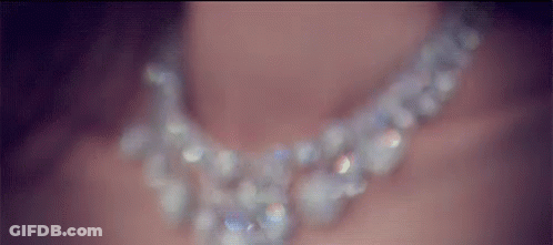 Woman Wearing Pearl Necklace Close Up GIF