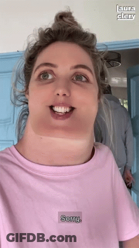 Woman Wearing Pink T-Shirt That Says Sorry GIF