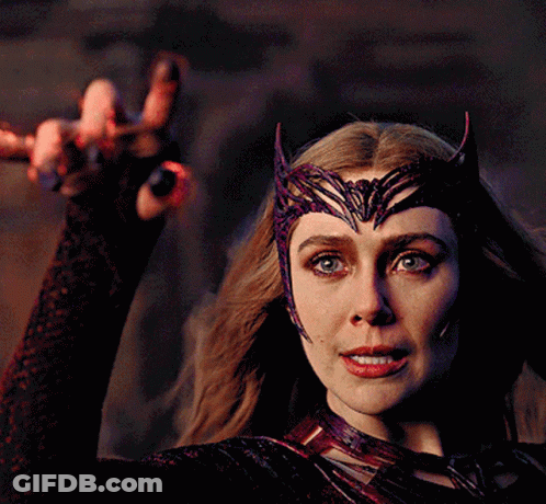 Woman Wearing Purple Crown GIF