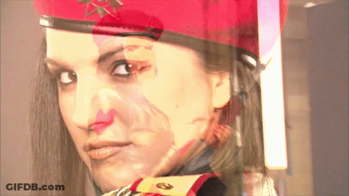 Woman Wearing Red Beret With Gold Star GIF
