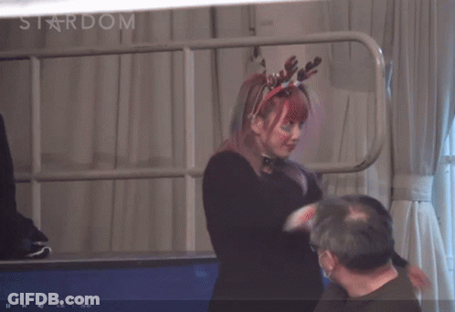 Woman Wearing Reindeer Headband GIF