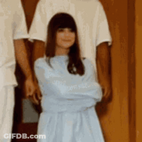 Woman Wearing Straight Jacket Smiling GIF