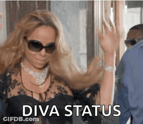 Woman Wearing Sunglasses And Necklace Diva Status GIF