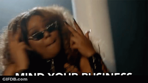 Woman Wearing Sunglasses Making Funny Face GIF
