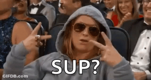 Woman Wearing Sunglasses Making Funny Face GIF