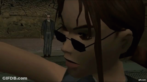Woman Wearing Sunglasses Next To Man In Suit GIF