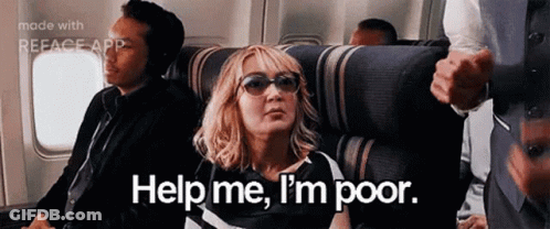 Woman Wearing Sunglasses Sitting On Airplane GIF