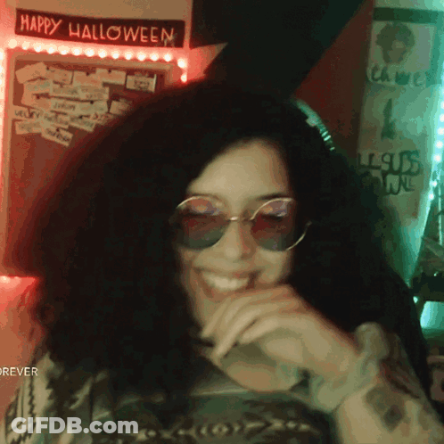 Woman Wearing Sunglasses Smiling GIF