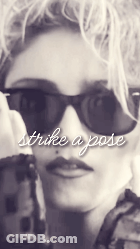 Woman Wearing Sunglasses Strike A Pose GIF