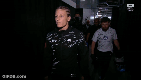 Woman Wearing UFC Jacket Walking GIF
