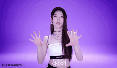 Woman Wearing White Top With Choom Waistband GIF