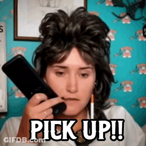 Woman Wearing Wig Talking On Phone GIF