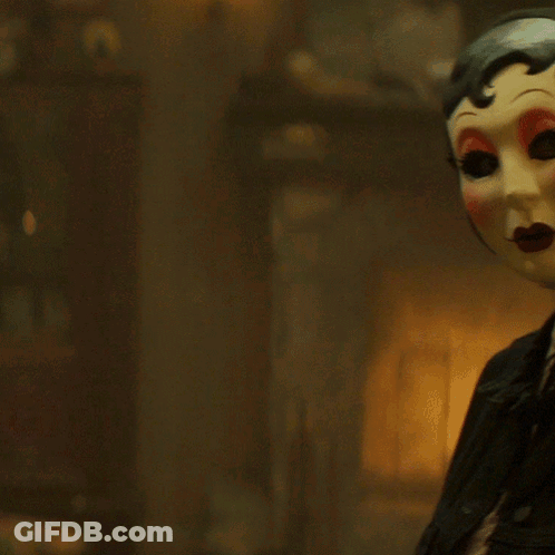 Woman Wearing Yellow Mask With Red Lips GIF
