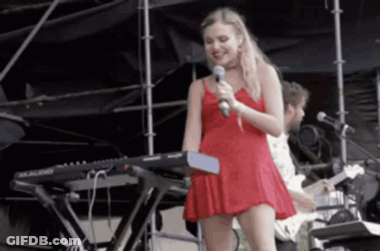 Woman Wedding Singer Plays Piano GIF