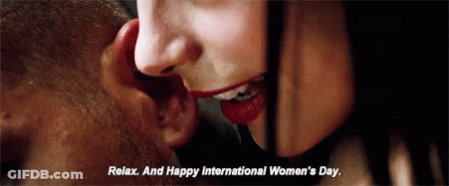 Woman Whispering Relax And Happy International Women's Day In Man's Ear GIF