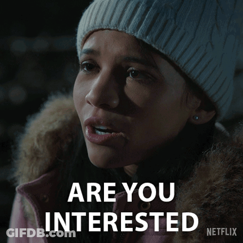 Woman White Beanie Pink Jacket Asks Are You Interested GIF
