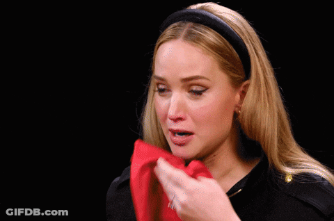 Woman Wipes Face With Red Cloth Saying What Do GIF