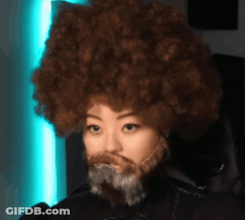 Woman With Afro And Beard Wearing Headphones GIF