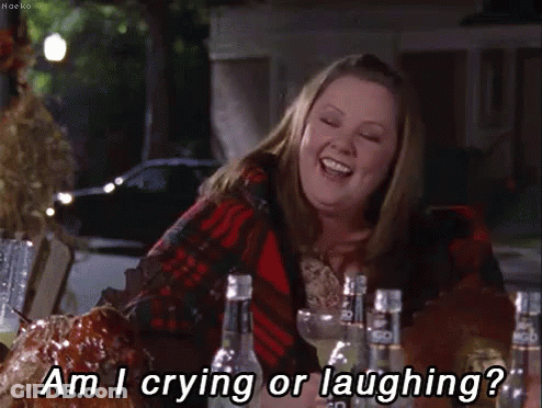 Woman With Alcohol Bottles Saying Am I Crying Or Laughing GIF