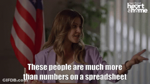 Woman With American Flag Saying People Are More Than Numbers GIF