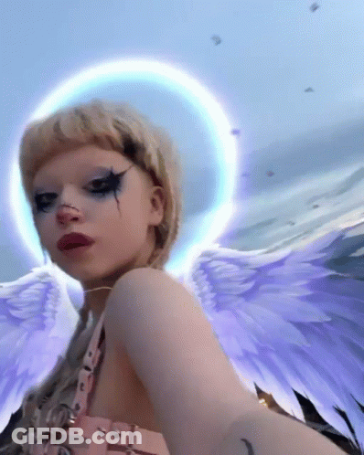 Woman With Angel Wings And Halo Selfie GIF