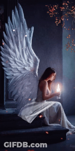 Woman With Angel Wings Holding Candle GIF