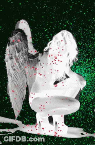 Woman With Angel Wings On Dark Background GIF