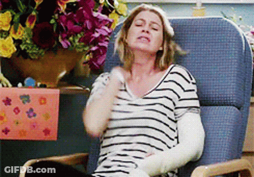 Woman With Arm Cast Sitting In Chair GIF