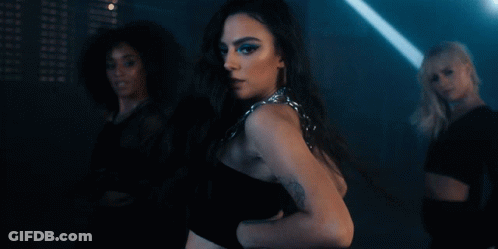 Woman With Arm Tattoo Dancing With Two Women GIF
