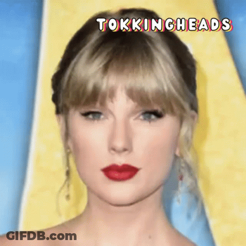 Woman With Arm Tattoo Sitting Next To Man's Hand GIF
