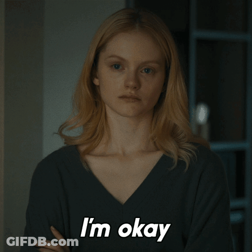 Woman With Arms Crossed Saying I'm Okay GIF