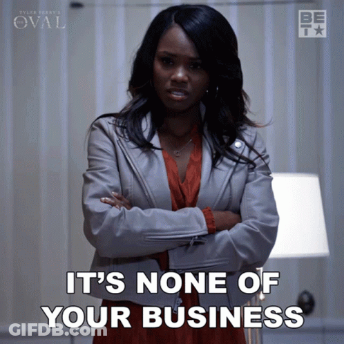 Woman With Arms Crossed Saying It's None Of Your Business GIF
