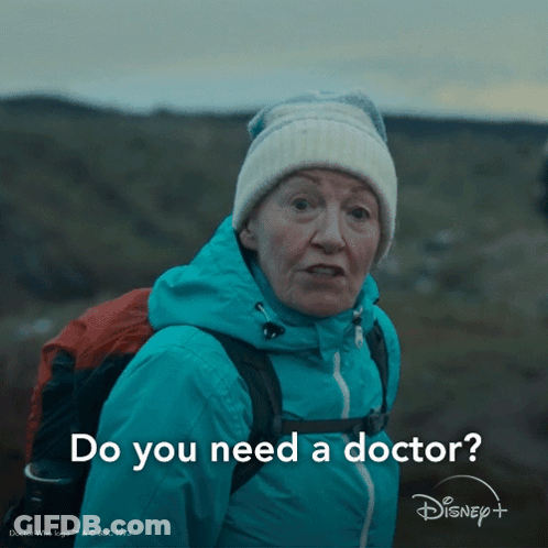 Woman With Backpack Asking For Doctor GIF