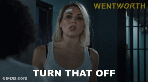 Woman With Bandage In Front Of Turn Off Sign GIF