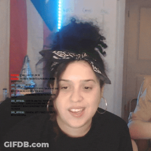 Woman With Bandana And Hoop Earrings Smiling GIF