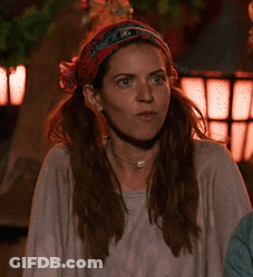 Woman With Bandana And Necklace Looks Serious GIF