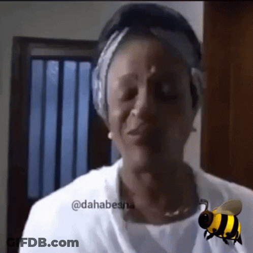 Woman With Bee Behind Saying Dahabesna GIF