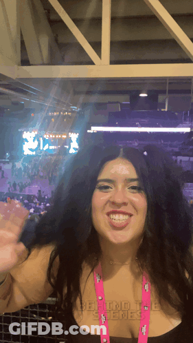 Woman With Behind The Scenes Smiles Lanyard GIF