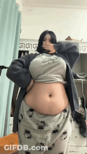 Woman With Big Belly In Hello Kitty Pajamas GIF