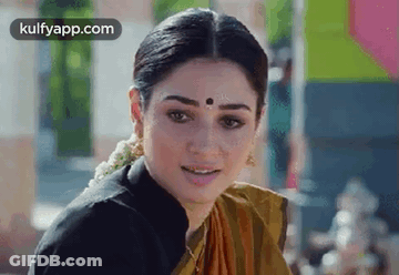 Woman With Bindi In Yellow Saree GIF