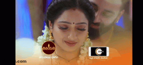 Woman With Bindi On Forehead And Man Behind Her GIF