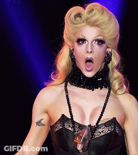 Woman With Bird Tattoo On Arm In Black Top GIF