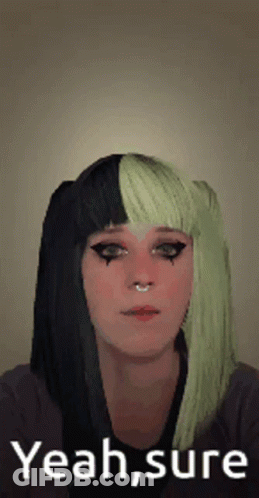 Woman With Black And Green Hair Making Funny Face Saying Yeah Sure GIF