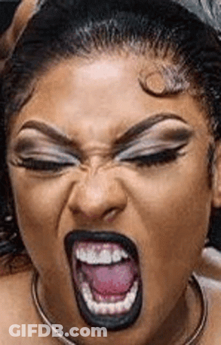 Woman With Black Lipstick Making Funny Face GIF