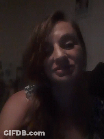 Woman With Black Makeup Taking Selfie GIF