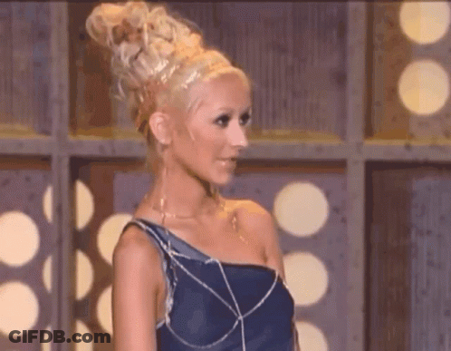 Woman With Blonde Hair And Blue Dress GIF