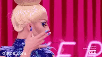 Woman With Blonde Hair And Blue Nails GIF