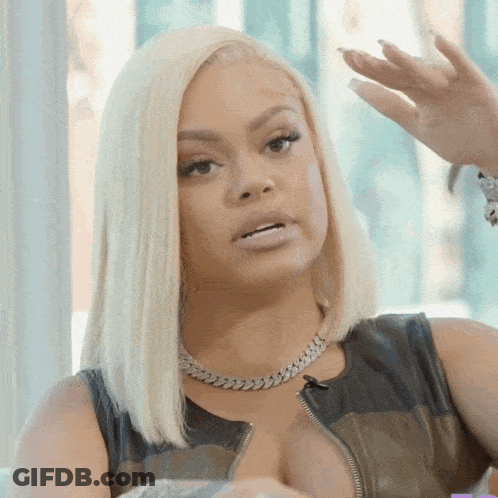 Woman With Blonde Hair And Leather Jacket GIF
