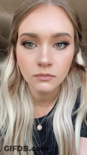 Woman With Blonde Hair And Nose Ring GIF