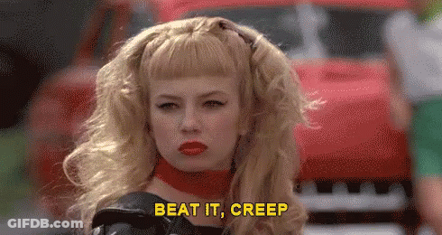 Woman With Blonde Hair And Red Lipstick Saying Beat It Creep GIF